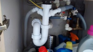 waste hose is connected to the sink unit