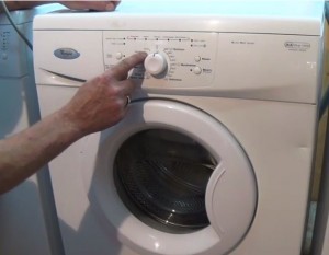 Enter test mode turn dial from OFF position to DRAIN on Whirlpool washing machine