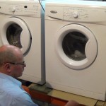 Inspecting Whirlpool washing machine for leaks