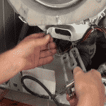 Bra wires get caught around washing machine heating elements