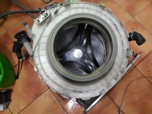 washing-machine-drum-damaged-by-baby-socks-or-screws-and-bra-wires